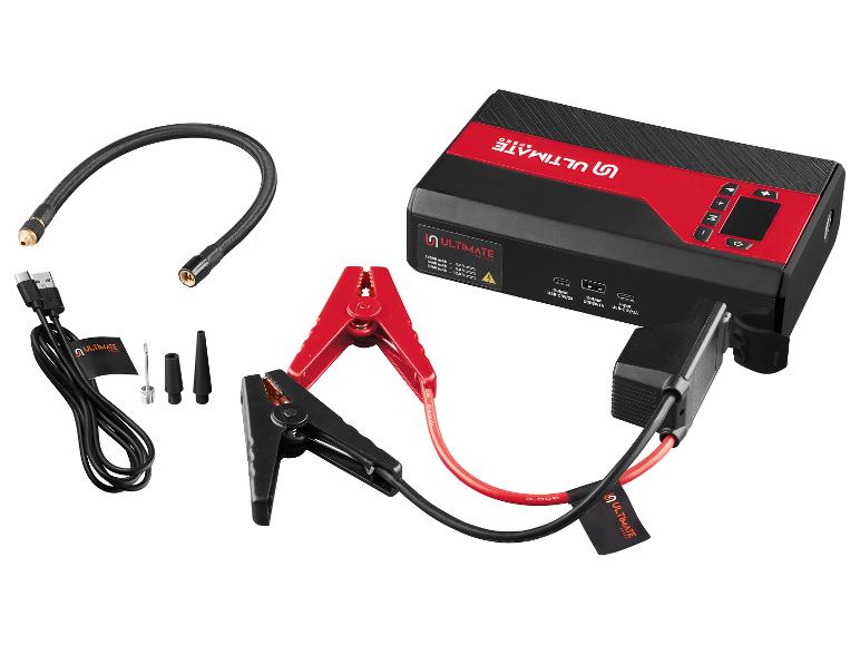 Draagbare auto-startbooster met compressor, USB-kabel en accessoires.