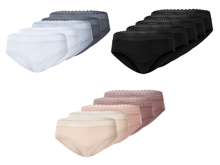 Een set van drie paar zwarte, witte en beige onderbroeken met kant.