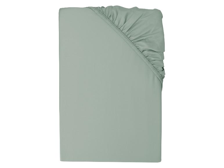 Groen hoeslaken met elastische hoek.