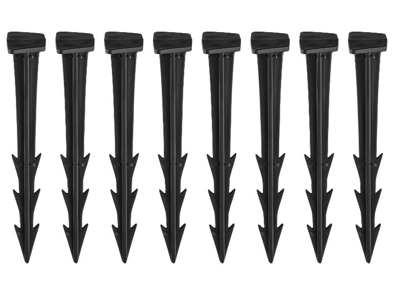 Zeven zwarte grondpinnen.