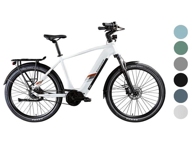 Witte elektrische fiets met bagagedrager en diverse kleuropties.