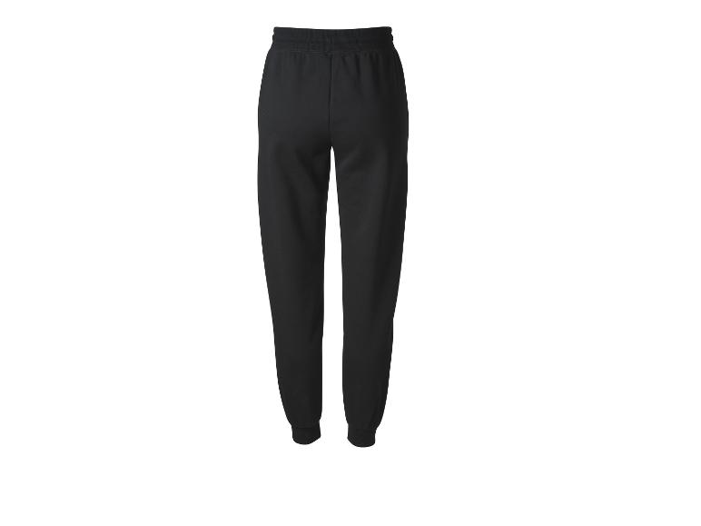 Zwarte joggingbroek met elastische tailleband en enkelboorden, achteraanzicht.