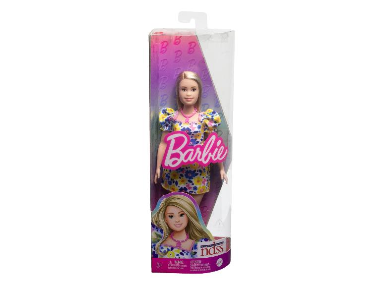 Barbie pop in een doos, met een bloemetjesjurk.