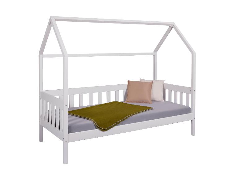 Wit houten kinderbed met hemelbed.