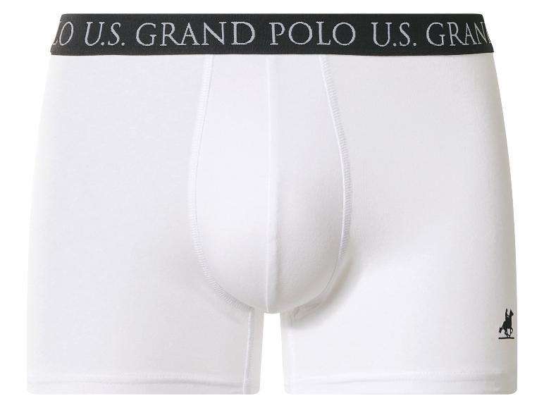 Witte boxershorts met zwarte elastische tailleband met tekst en ruiterlogo.