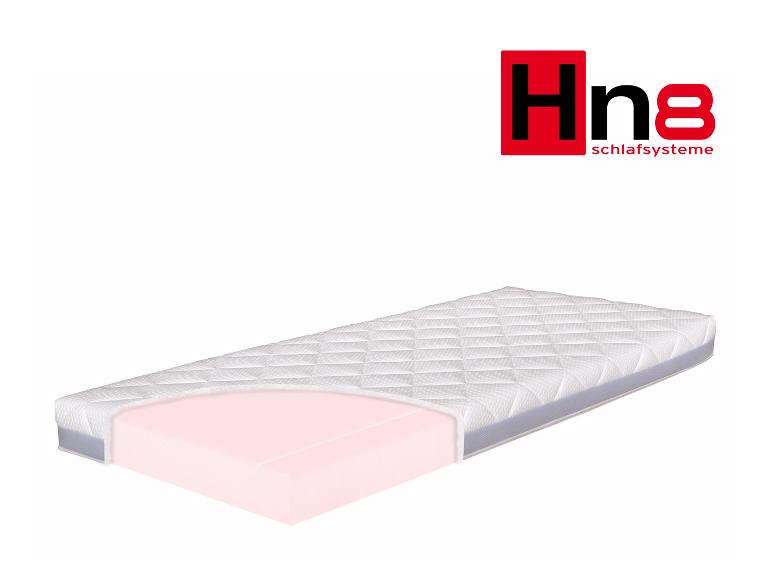 Hn8 Schlafsysteme matras met zichtbare roze schuimkern.