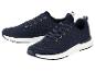 Paar donkerblauwe gebreide sneakers met witte zolen