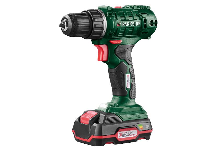 Accuboormachine met accu in groen, zwart en rood.