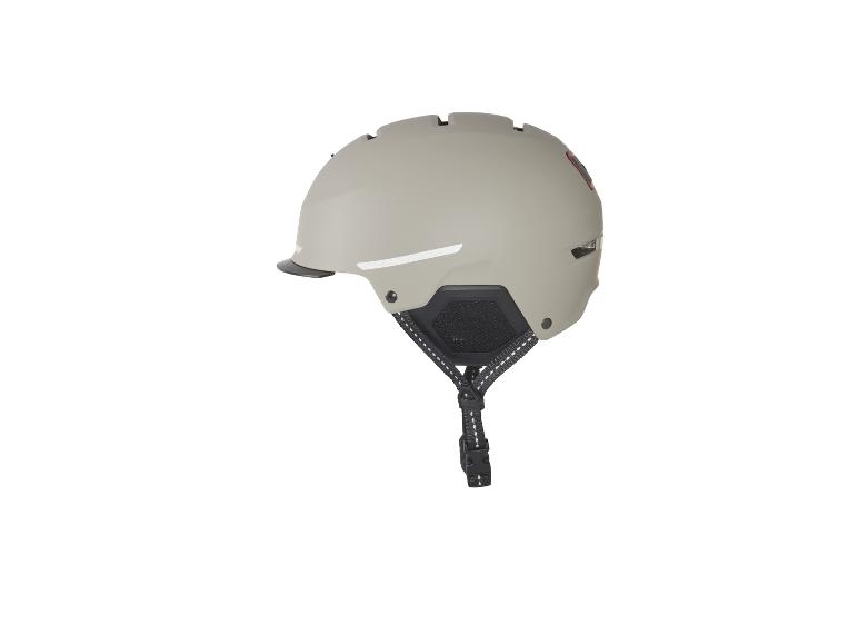 Een beige fietshelm met zwarte banden