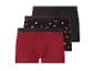 Set van drie herenboxershorts: rood, zwart met pretzels en effen zwart.