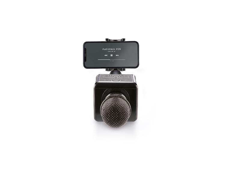 Een zwarte draadloze microfoon met een smartphone die muziek afspeelt.
