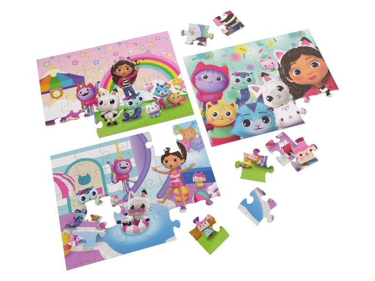 Drie Gabby's Dollhouse puzzels met losse stukjes