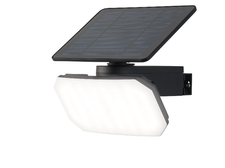 Zwarte LED-solarspot met geïntegreerd zonnepaneel.