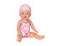 Babypop in roze flamingo zwempak en roze badmuts.