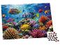 Puzzel met kleurrijke vissen en koralen in een onderwaterrif