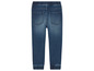 Een paar blauwe jeans met elastische tailleband.