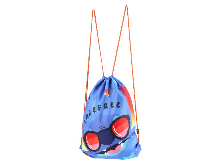 Blauwe trekkoordrugzak met een cartoonfiguur met zonnebril en het woord 'CAREFREE'.