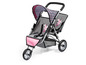 Een roze en grijze kinderwagen met een fairy-print.