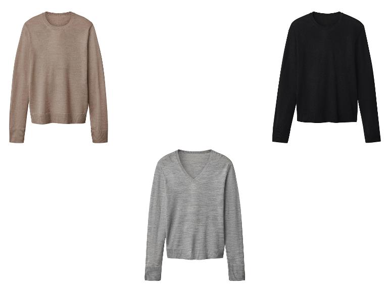 Drie merinowollen truien: beige, zwart en grijs.