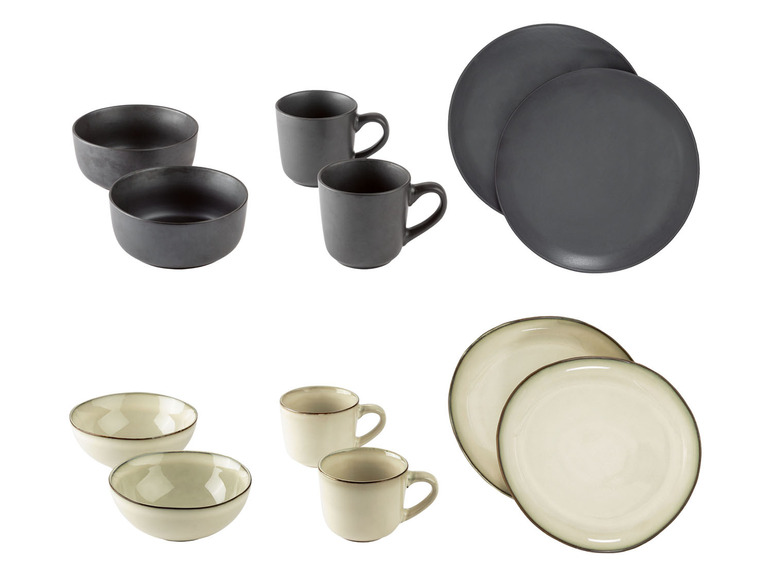 Zwarte en crèmekleurige kommen, bekers en borden.