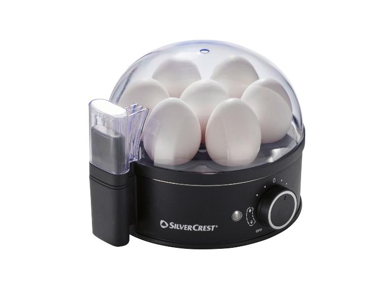 SilverCrest eierkoker met zeven witte eieren onder een transparant deksel
