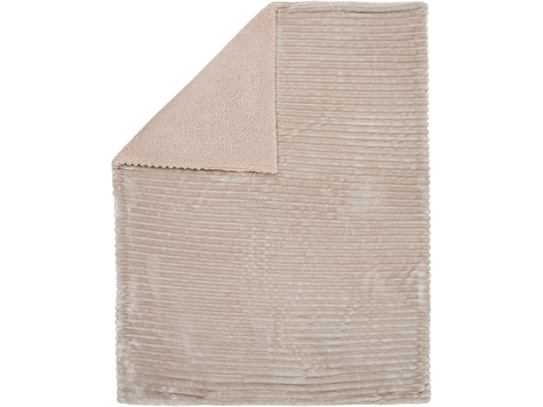 Zachte beige deken met een geribbelde en een sherpa zijde.