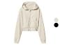 Beige dames hoodie met rits, zakken en manchetten.