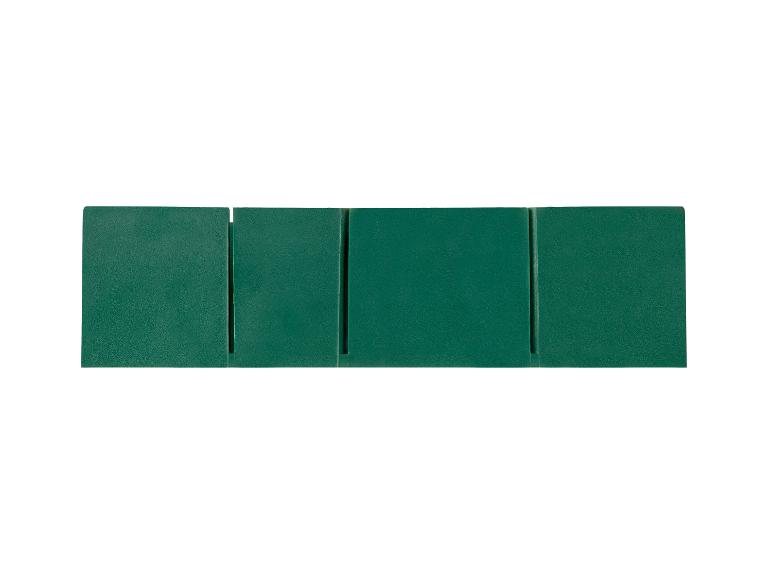 Vier groene verdelers voor lades of planken.
