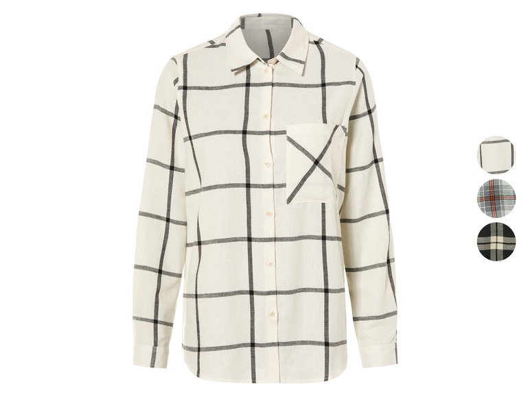 Een wit overhemd met zwarte ruitjes en lange mouwen.