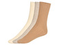 Drie paar sokken in beige en bruin tinten.