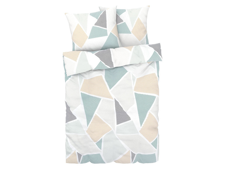 Beddengoed met een geometrisch patroon in blauwe en beige tinten.