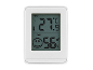 Witte digitale thermometer en hygrometer met LCD-scherm, toont 27.9°C en 56% luchtvochtigheid.