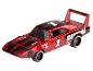 Een rode Hot Wheels Dodge Charger Daytona met witte banden.