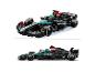 Twee aanzichten van een zwarte en teal LEGO Technic Mercedes-AMG F1 W14 E Performance auto.