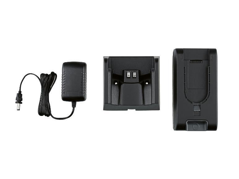Acculader met voedingsadapter en accupack.