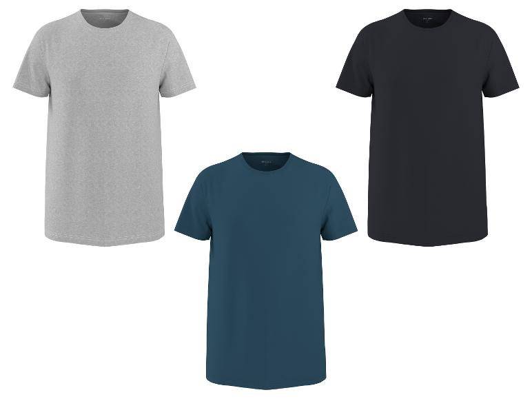 Drie effen T-shirts in grijs, donkerblauw en zwart.