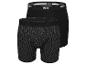 Twee zwarte boxershorts van het merk Mexx, een met een klein motief.