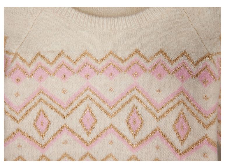 Witte trui met geometrisch roze en gouden patroon.