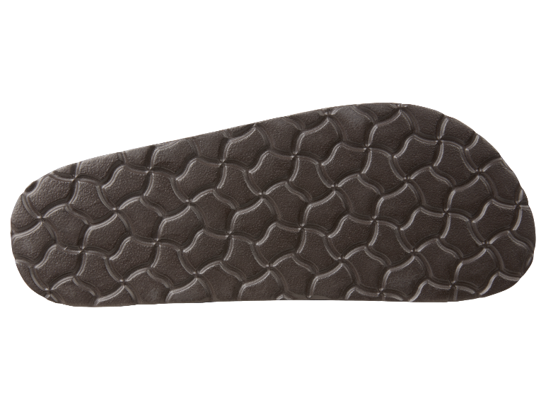 Donkerbruine zool van een sandaal met reliëfpatroon.