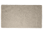Lichtbeige rechthoekig tapijt.