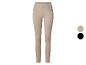 Beige dameslegging met hoge taille en zwarte kleurstalen.