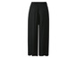 Zwarte wijde broek met elastische tailleband.
