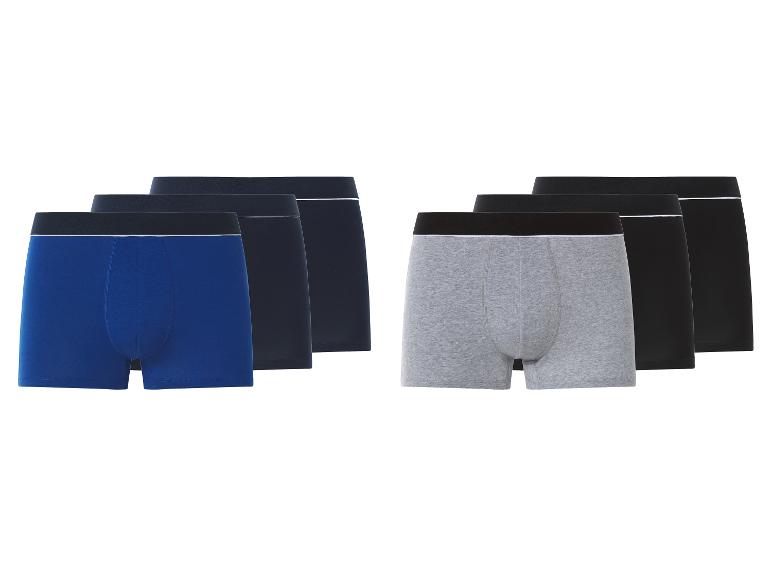 Herenboxershorts in blauw, marineblauw, grijs en zwart, gerangschikt in twee sets van drie