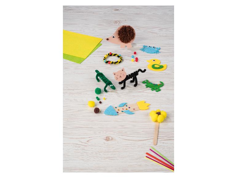 Creatieve knutselspullen: egel, kat, krab, eend, krokodil, raket, bloem en kralen.