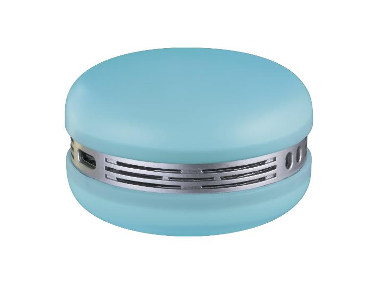 Turquoise ronde luidspreker met een zilverkleurig rooster in het midden.