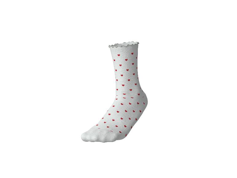 Witte sok met rode hartjes en ruches rand