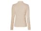 Beige geribbelde top met hoge hals en lange mouwen.