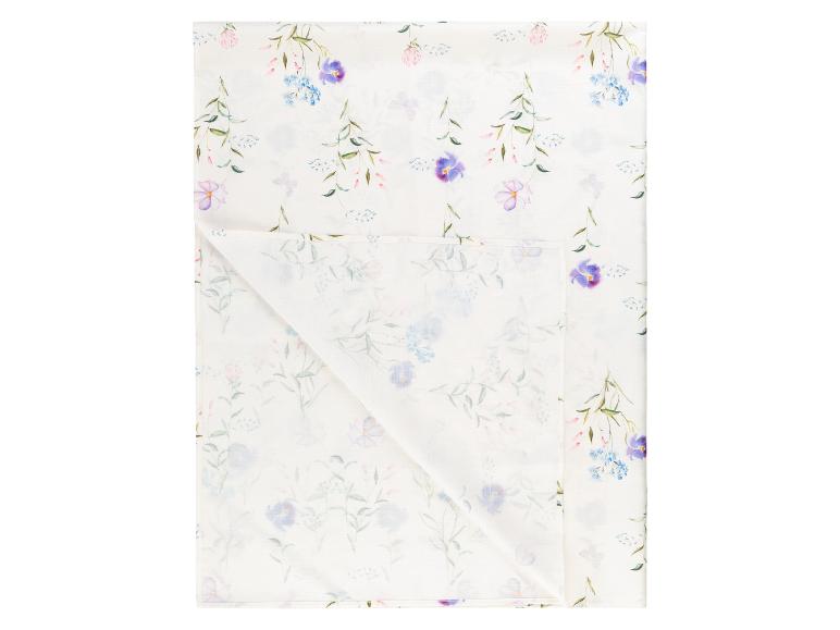 Een witte tafelkleed met een bloemenprint.