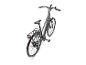 Zwarte elektrische fiets met bagagedrager en display op het stuur, bovenaanzicht.