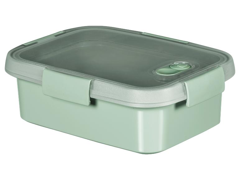 Een groene lunchbox met een transparante deksel